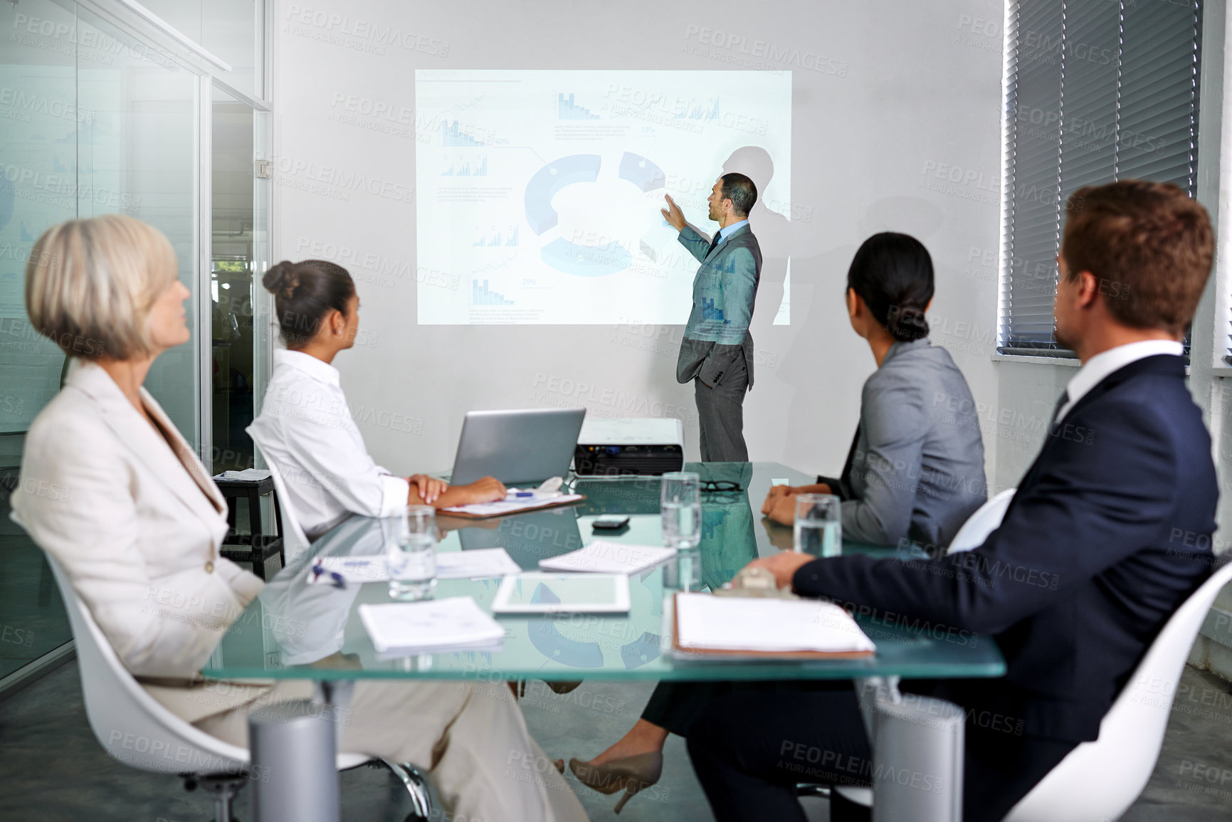 Buy stock photo Presentation, business people and presenter with projector screen, graphs for planning meeting and info in conference room. Data analysis, statistics and research for corporate project with team