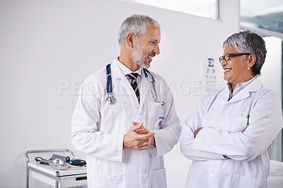 Buy stock photo Teamwork, optometry and doctors in hospital for discussion, insurance and meeting. Healthcare, optician and man and woman in conversation, talking and chat for medical care, eye care and consulting