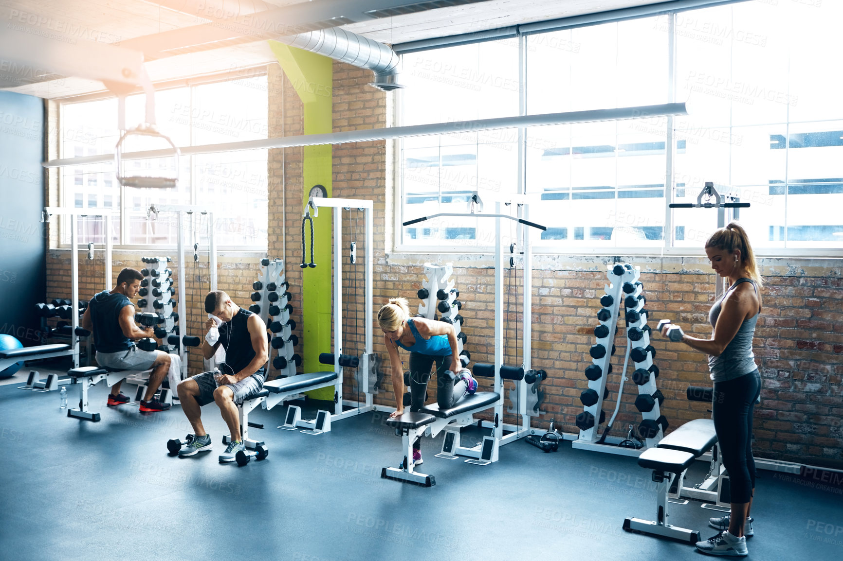 Buy stock photo Fitness, machine and vitality with people in gym together for training or workout routine. Equipment exercise and performance with athlete group in health club for bodybuilding or weightlifting