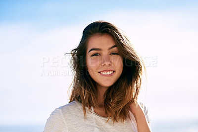 Buy stock photo Portrait, happy and woman on holiday with sky in nature, relax and smile face with tourist on the beach. Paradise, travel and weekend getaway, confident and calm or Colombian female person in summer