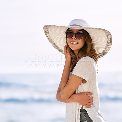 Buy stock photo Sunglasses, happy and portrait of woman at beach for summer holiday, tourism and adventure in Miami. Outdoor, smile and relax by ocean with hat for travel, weekend trip and confidence on vacation