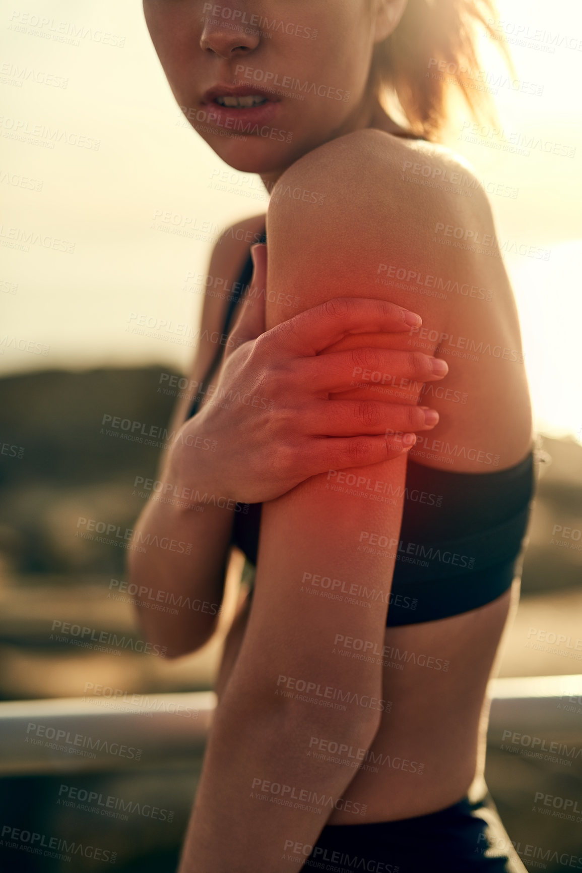 Buy stock photo Woman, shoulder and pain in red from outdoor training, fitness and muscle injury as athlete. Sport, female person and glow for medical disease with joint arthritis from sports accident for care


