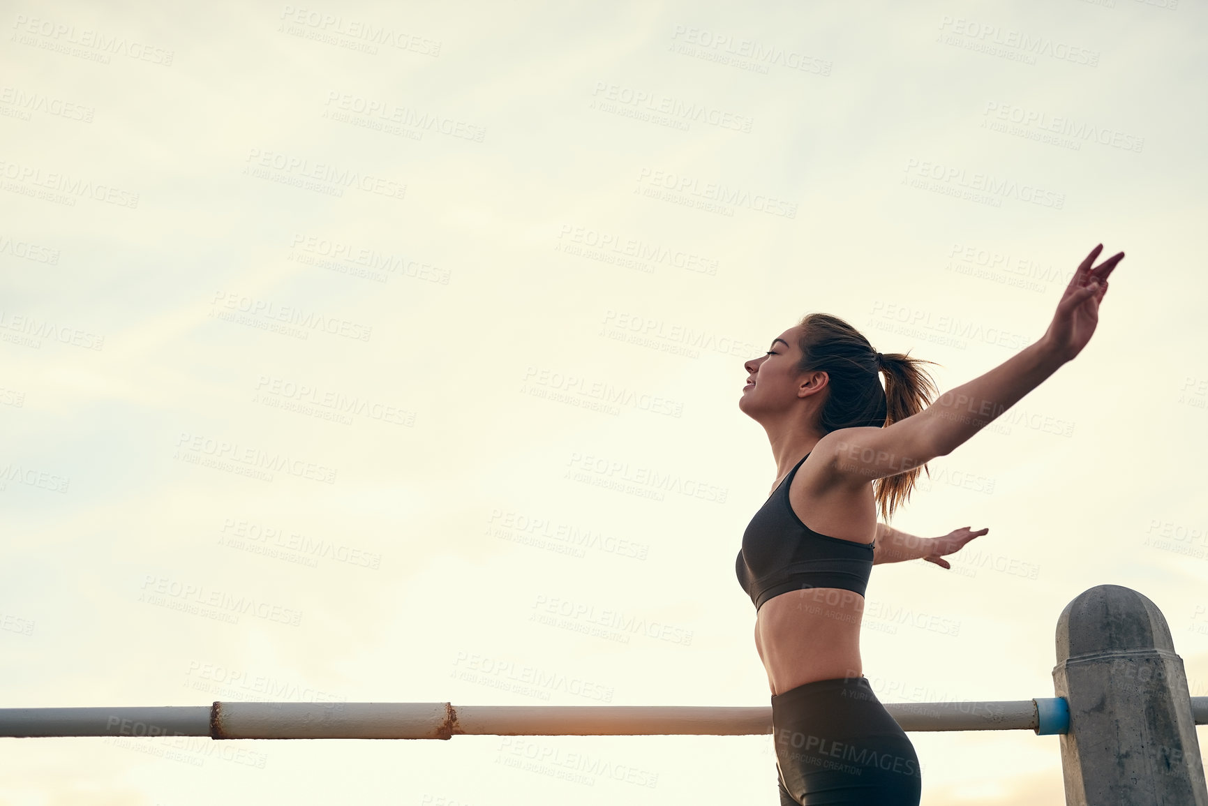 Buy stock photo Woman, sunset and arms in air in nature for freedom, exercise and fitness in summer. Runner, celebration and athlete with success outdoor for workout, training and achievement for wellness in morning