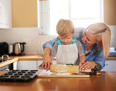 Buy stock photo Baking, mother and boy child with dough in kitchen for teaching, learning or development in home. Recipe, happy woman and young kid with rolling pin for sweet snack, pastry dessert or cookies