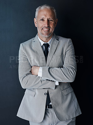 Buy stock photo Portrait of confident, mature lawyer with suit, smile and arms crossed on dark background in studio. Happy, professional and executive attorney ceo or senior business owner at law firm with pride.