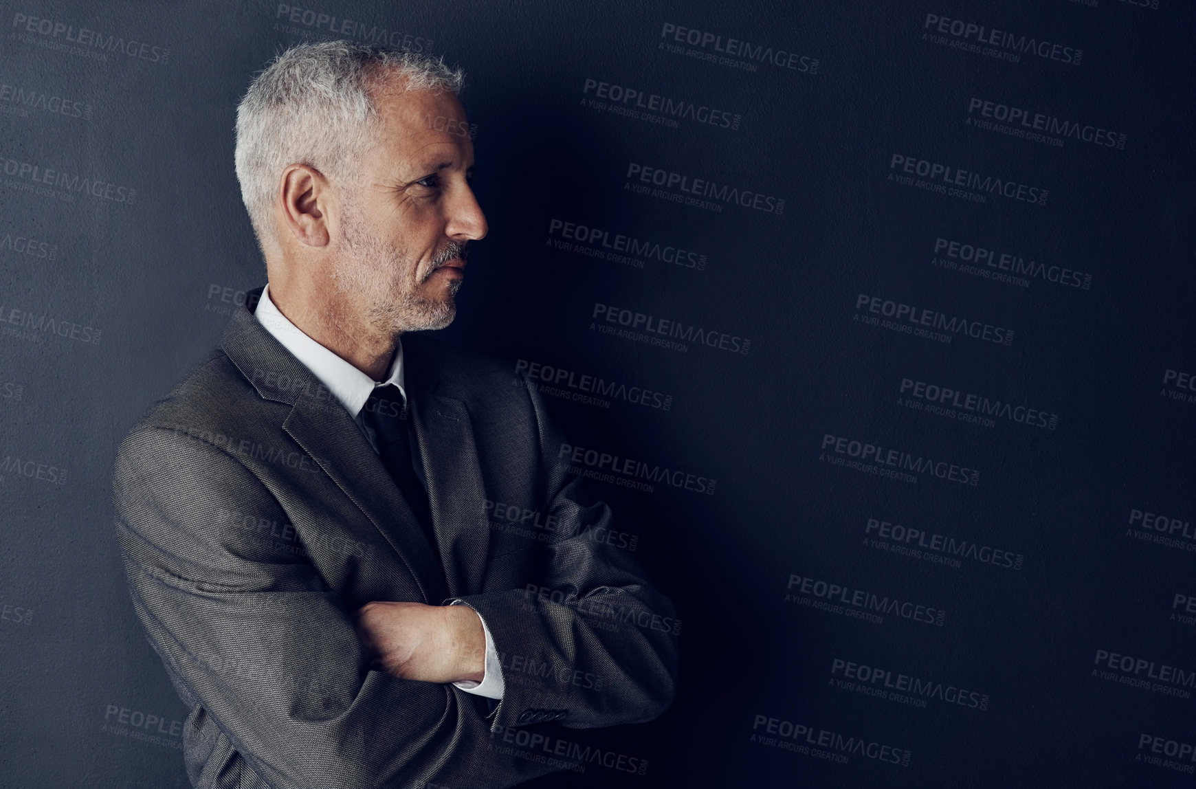 Buy stock photo Senior executive, business man and arms crossed, confidence and management on dark background. Male CEO, corporate director in suit and ambition, mockup space with empowerment and career in studio