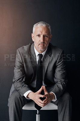 Buy stock photo Mockup, chair and serious portrait of businessman, lawyer or attorney, confidence on dark background and studio. Boss, ceo and professional business owner, proud senior executive director at law firm