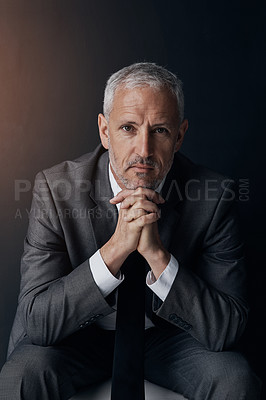 Buy stock photo Serious portrait of senior lawyer, confident businessman or legal advisor in suit on dark background in studio. Boss, ceo or business owner with pride, senior executive director or law firm attorney.