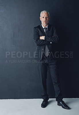 Buy stock photo Portrait, serious and confident businessman with arms crossed in pride, lawyer or attorney on dark background. Boss, ceo and professional business owner, proud senior executive director at law firm.