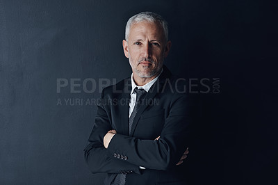 Buy stock photo Senior executive, business man and arms crossed with confidence in portrait and management on dark background. Male CEO, corporate director and suit with ambition, empowerment and career in studio
