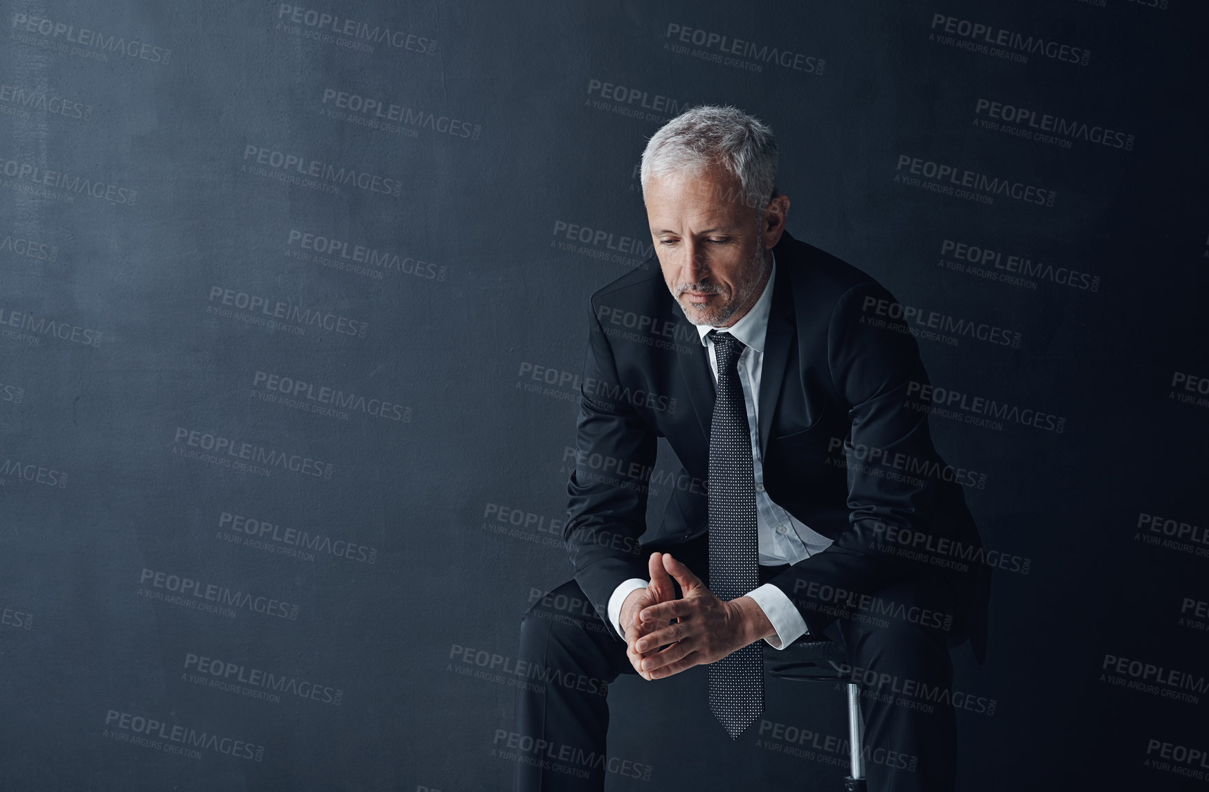 Buy stock photo Businessman, stress and sad thinking in studio, depression and bankruptcy on dark background. Mature person, accountant and contemplating mistake or stock market disaster, chair and mockup space