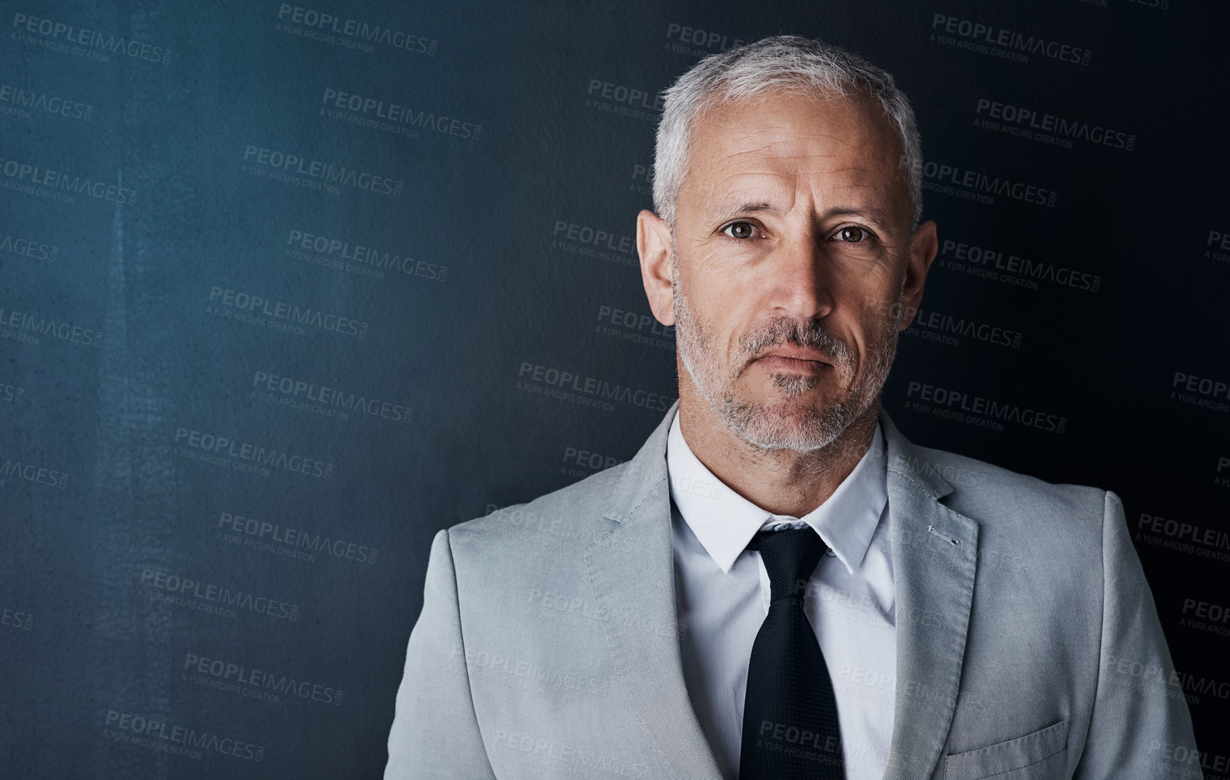 Buy stock photo Senior executive, business man and headshot, portrait with confidence and management on dark background. Male CEO, corporate director in studio and suit with ambition, empowerment and mockup space