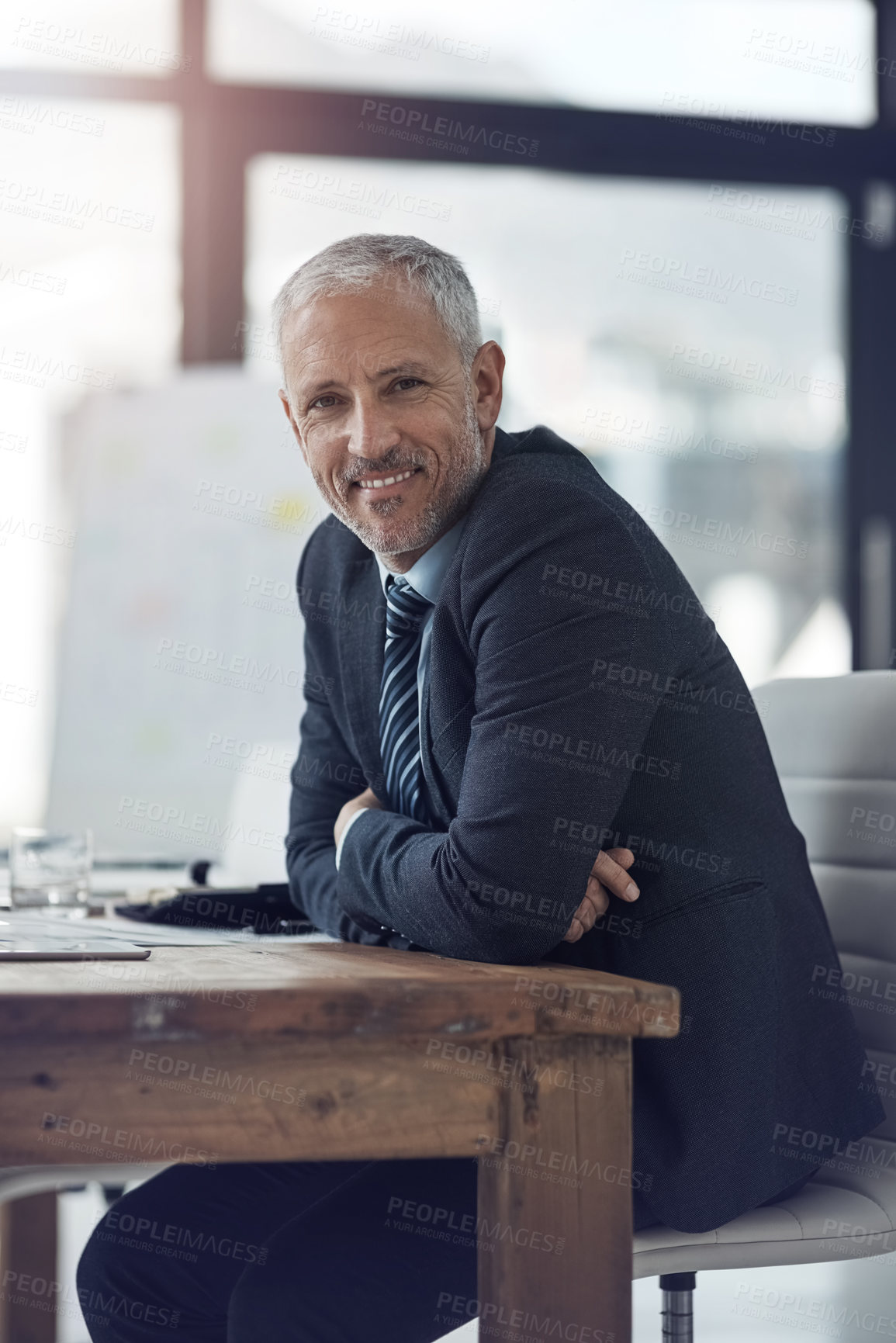 Buy stock photo Mature, businessman and portrait with happiness, pride and confidence in office or company. Male person, arms crossed and smile at desk as accountant or professional in financial agency or banking