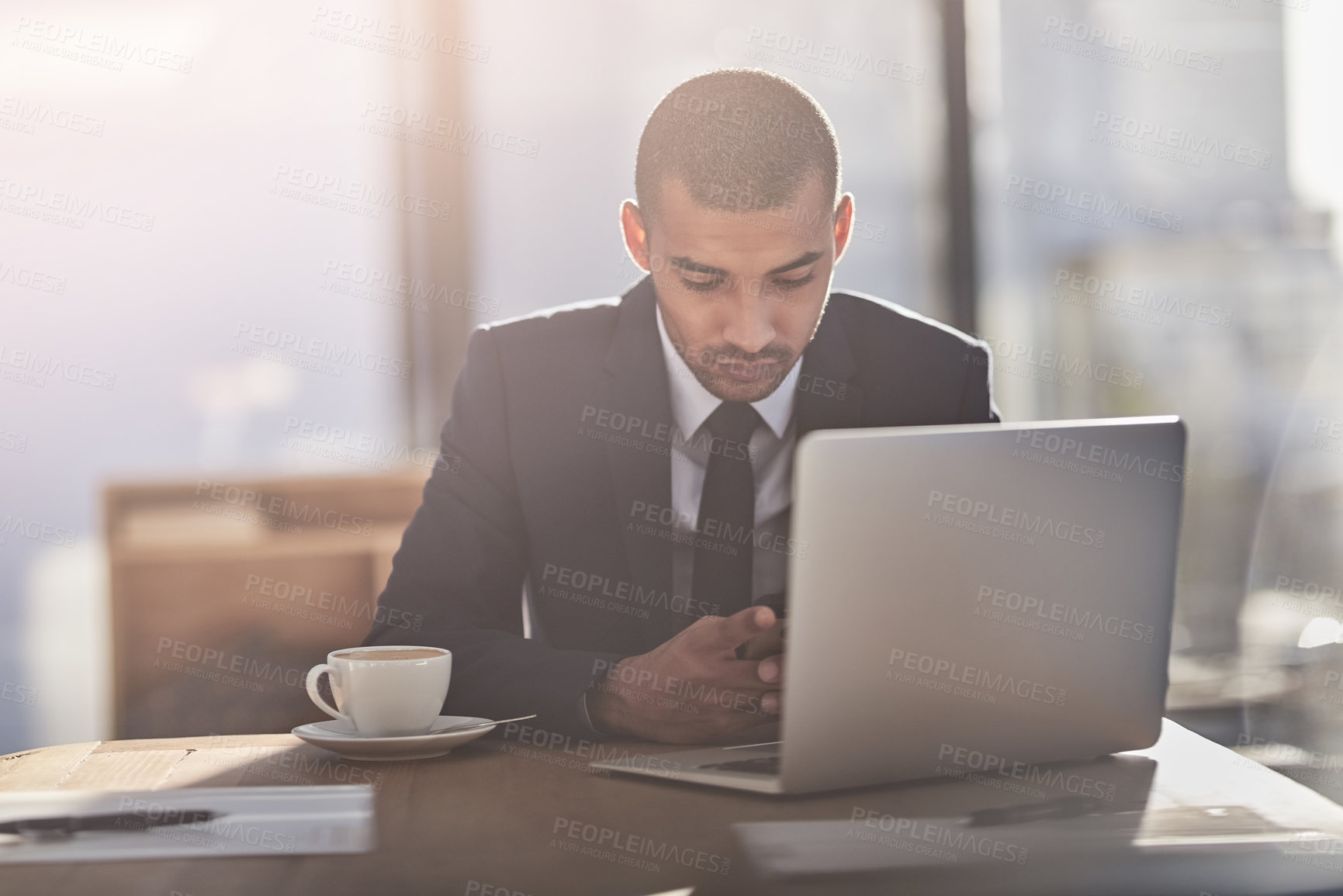 Buy stock photo Businessman, phone and laptop in office for finance, online banking and client contact. Trader, computer or mobile in agency for economy news, check stock market or research investment opportunity