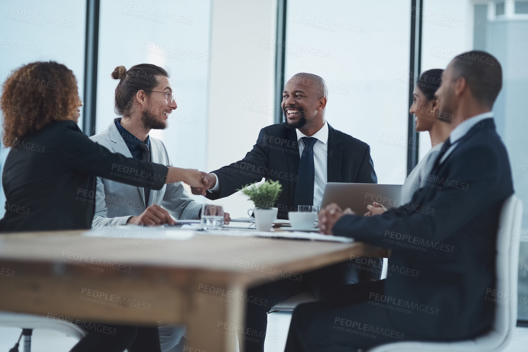 Buy stock photo Handshake, clients meeting and business people in partnership, lawyer agreement and thank you, success or deal. Corporate woman, manager or employees shaking hands for thanks, negotiation or law firm