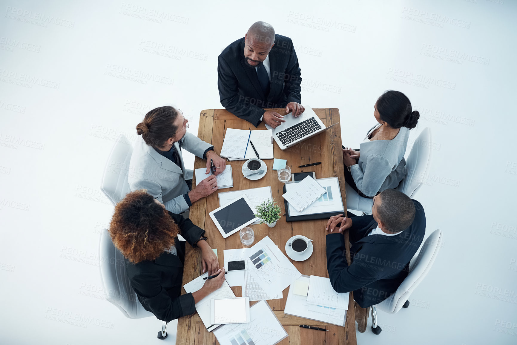 Buy stock photo Business people, meeting and collaboration with tech and public relations with teamwork in office. Above, employee internet with paperwork, staff and discussion with laptop and feedback review