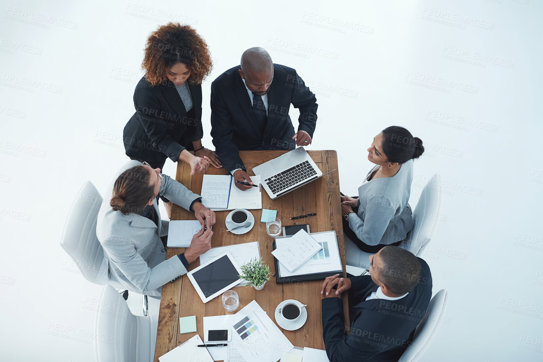Buy stock photo Business people, meeting and digital collaboration with tech and public relations with teamwork in office. Above, employee internet with paperwork and discussion with laptop and feedback review