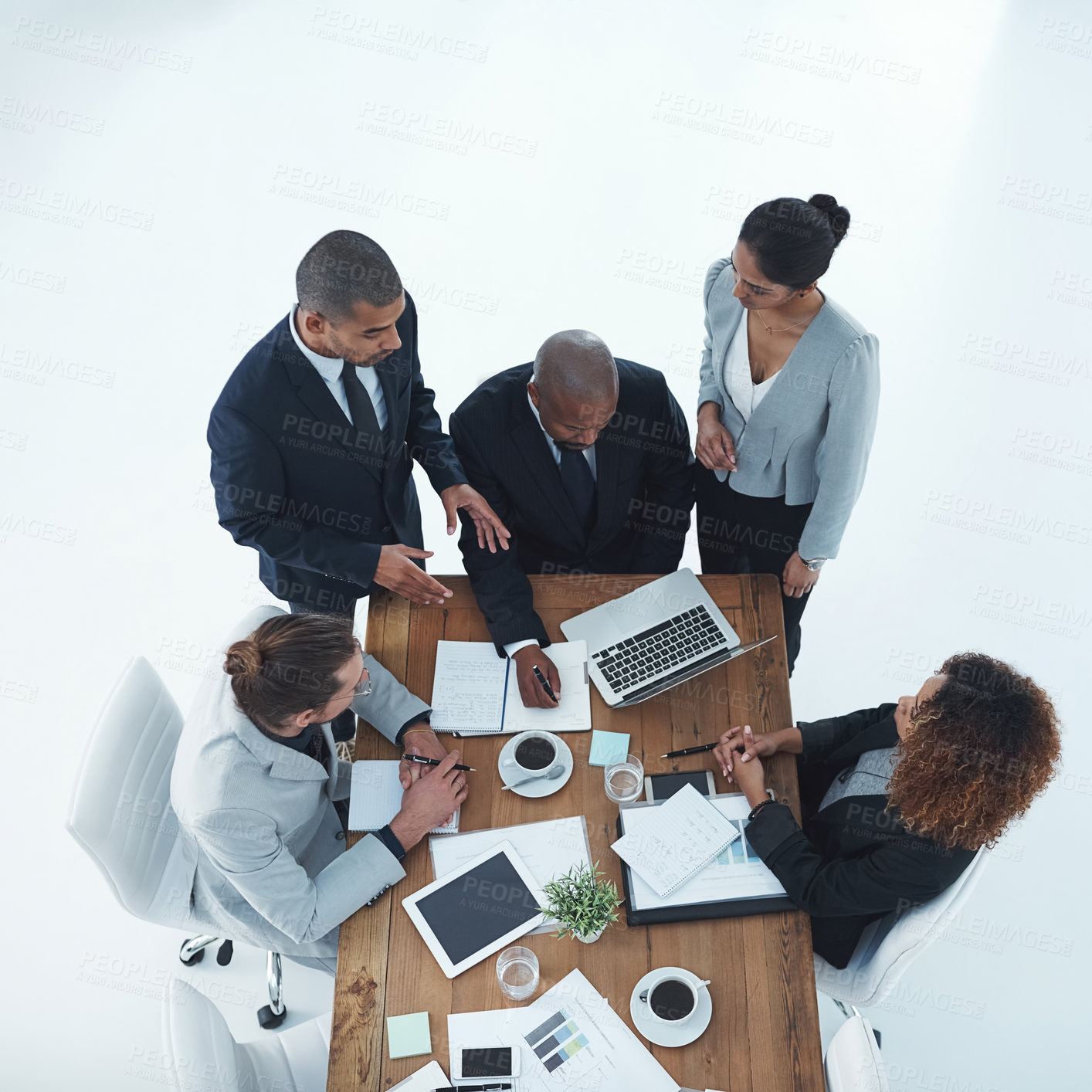 Buy stock photo Laptop, paperwork and above of business people in office for meeting, discussion and planning. Corporate, professional and workers on computer for online research, financial review and collaboration