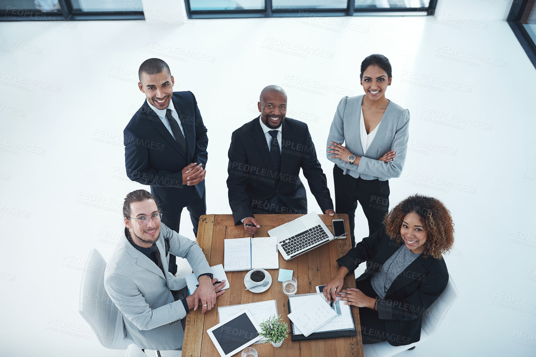 Buy stock photo Business people, meeting and portrait with tech and public relations with teamwork in office. Above, employee internet with paperwork, staff and discussion with laptop and feedback review with data