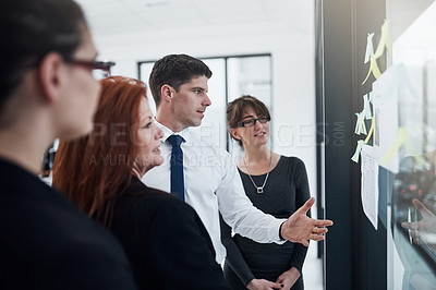 Buy stock photo Talking, reading and collaboration of group, glass and brainstorming of colleagues or ideas. Sticky notes, teamwork and corporate people with information, planning or underwriter of insurance company