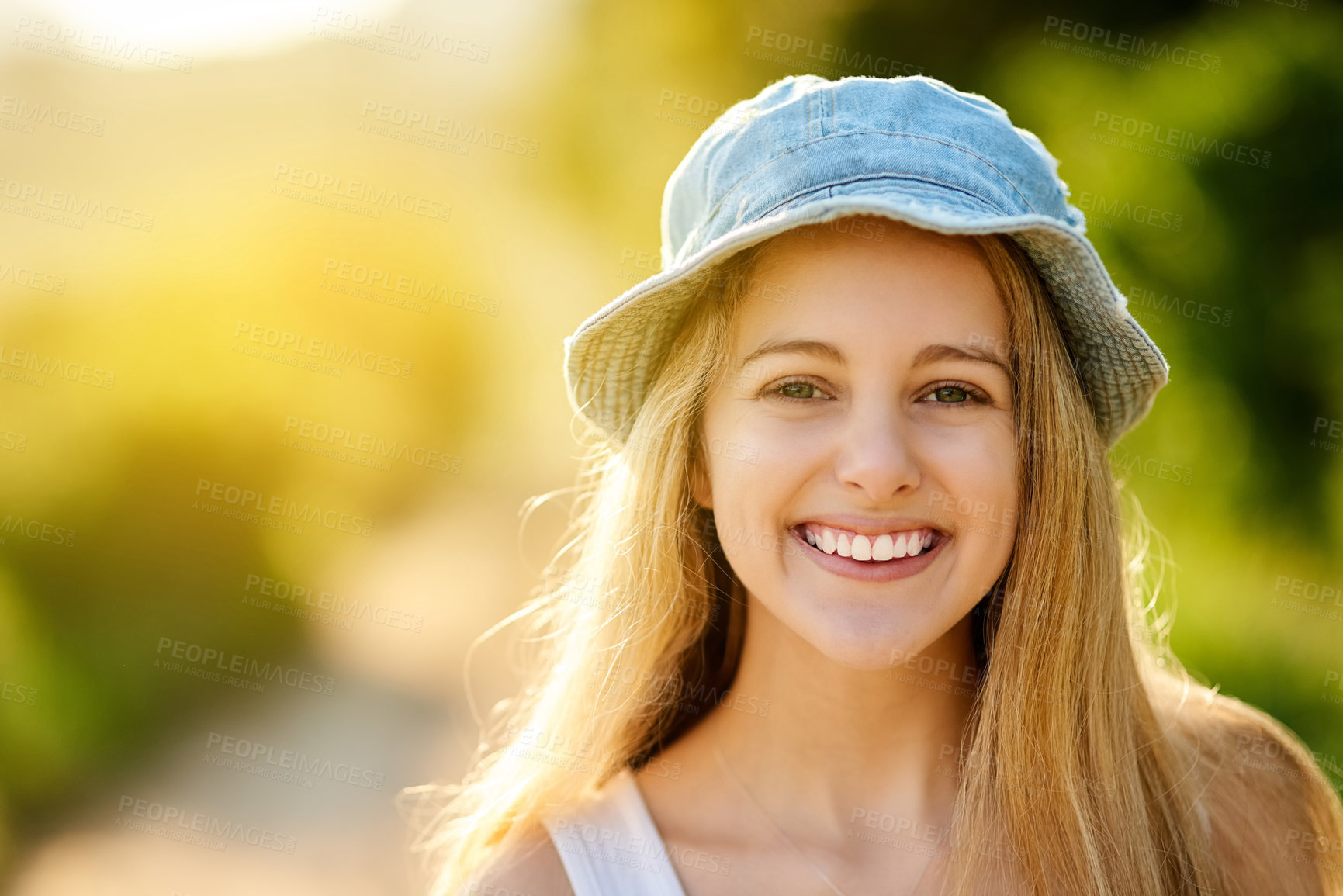 Buy stock photo Girl, portrait and confident smile in outdoor, travel and spring for health or wellness in garden. Female person, trees and countryside holiday or vacation, aesthetic and hat in nature on adventure