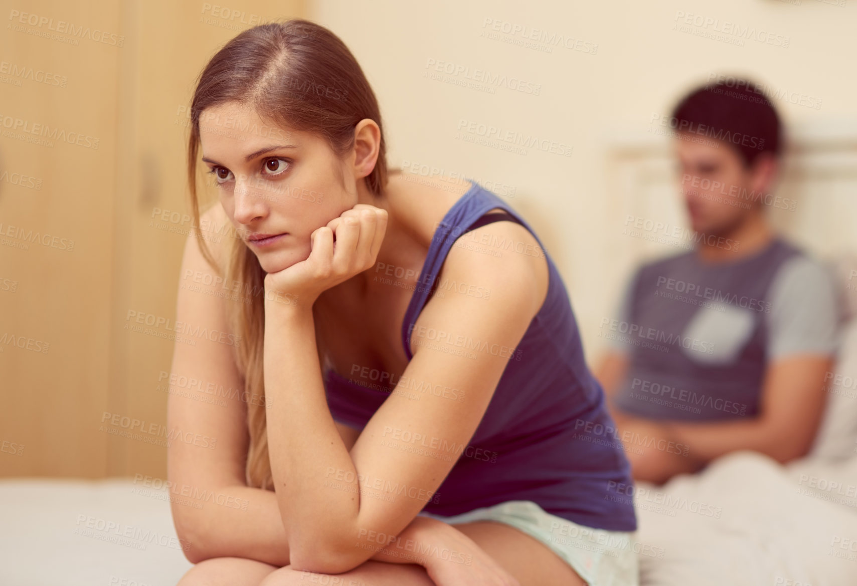 Buy stock photo Girl, unhappy and thinking in bedroom with man after argument,  fight and thoughts of past trauma or communication issues. Couple, home and woman upset with ideas of break up or divorce and conflict.