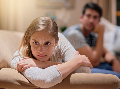 Buy stock photo Cropped shot of an unhappy young couple after a fight at home