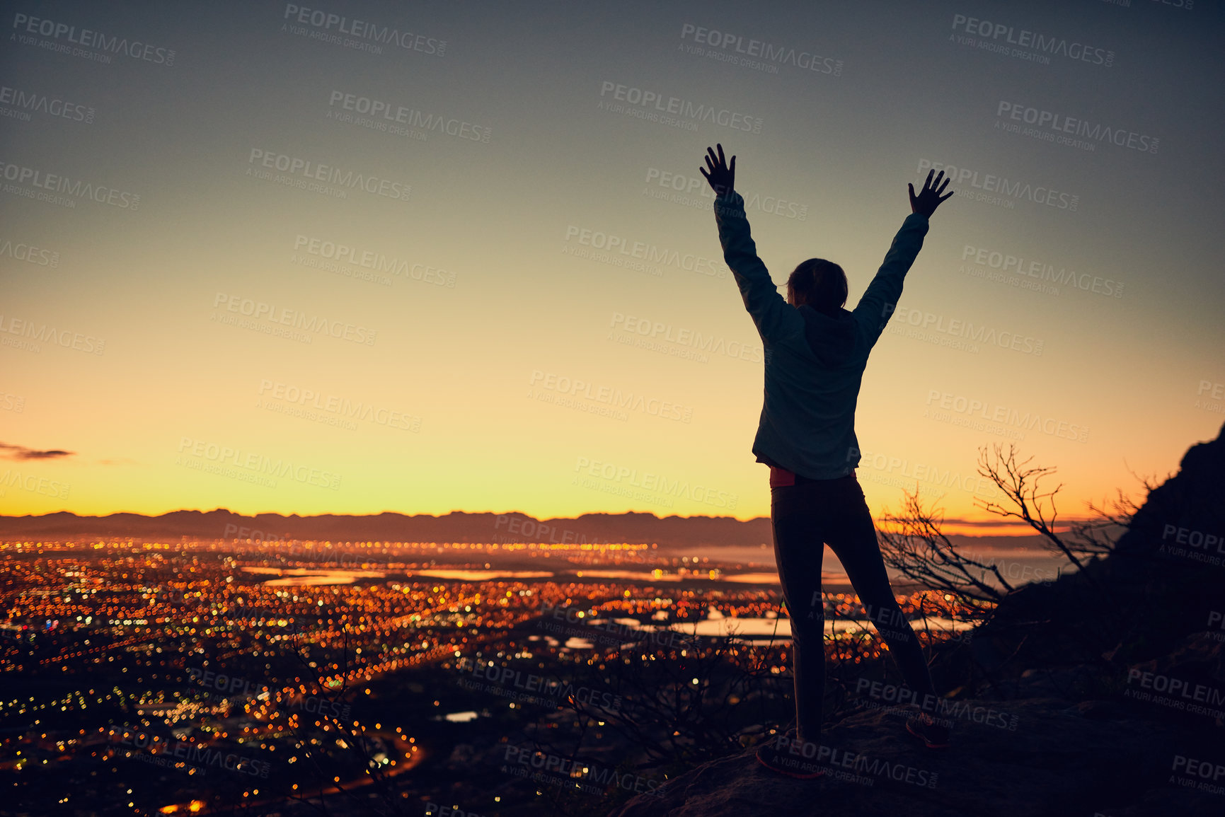 Buy stock photo Woman, silhouette and freedom on mountain with fitness for exercise success, workout victory and celebration. Athlete, person and hand gesture in nature with sunrise, city lights in morning on mockup