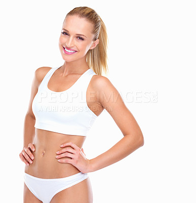 Buy stock photo Studio shot of a young attractive woman posing against a white background