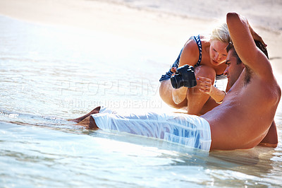 Buy stock photo Beach, relax and couple with vacation, camera and love with weekend break, getaway trip or memory. People, outdoor or man with woman, picture or photograph with summer, holiday or ocean with sunshine