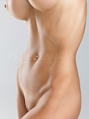 Buy stock photo Cropped image of a nude attractive womans stomach