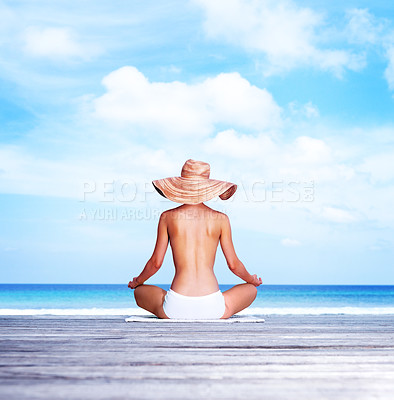 Buy stock photo Travel, meditation and topless with woman at beach for sunbathing, summer and freedom in Bali. Relax, yoga and tropical with girl meditating in bikini on vacation for mockup, peace and beauty