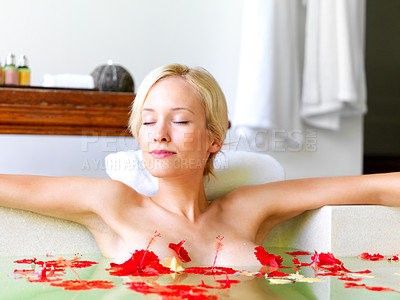 Buy stock photo Relax, spa and flowers with woman in bath for skincare, aromatherapy or tropical vacation in Bali villa. Summer, beauty and luxury with girl in jacuzzi for spa, hotel and resort on travel destination