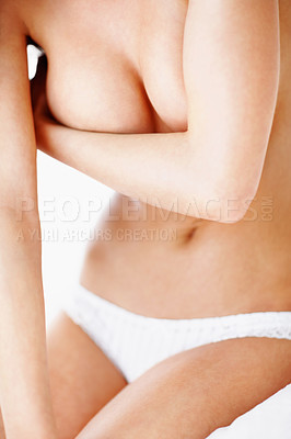 Buy stock photo Sexy, beauty and arms on boobs of woman for sensual, cleavage and studio temptation. Artistic, erotic and seductive with breast of girl for attractive, flirting and desire in lingerie or underwear