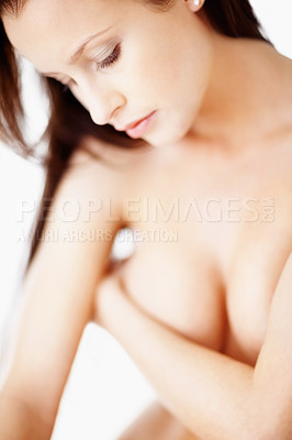 Buy stock photo Portrait of a sexy naked female covering her breast