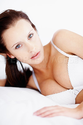 Buy stock photo Lingerie, boobs and portrait of a woman on a bed showing body and bra underwear for beauty, fashion and sexuality. Sexy female model in a house or hotel for desire, seduction and feminine art deco