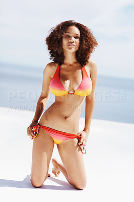 Buy stock photo Travel, bikini and portrait of a black woman at beach for summer break, sunbathing and Brazil destination. Blue sky, ocean and tropical with girl in swimsuit for sexy, beauty and confident on trip