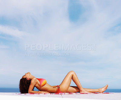 Buy stock photo Relax, sexy and bikini with body of woman at beach for sunbathing, tropical and peace on Brazil vacation. Summer break, sun and blue sky with girl tanning on deck of resort for travel and mockup