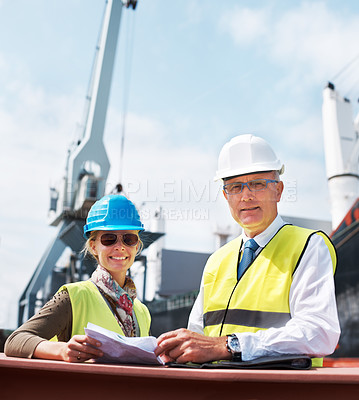 Buy stock photo Ship engineer team planning in a meeting on the dock talking about paper work, cargo and shipping. Portrait of happy and smiling logistics managers working in the import and export industry