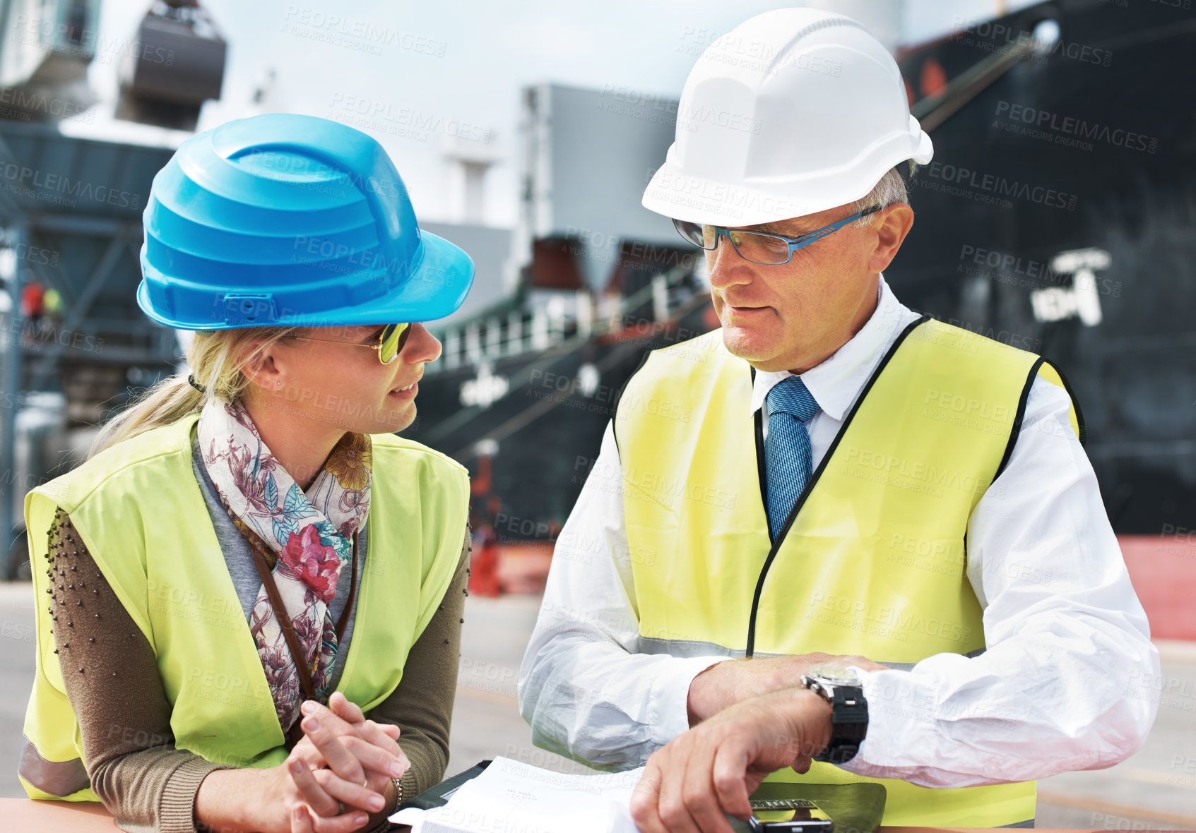 Buy stock photo Dock worker, shipping and cargo delivery industry workers in safety gear working on logistics papers of the transportation. Supply chain, administration and managers in collaboration and conversation