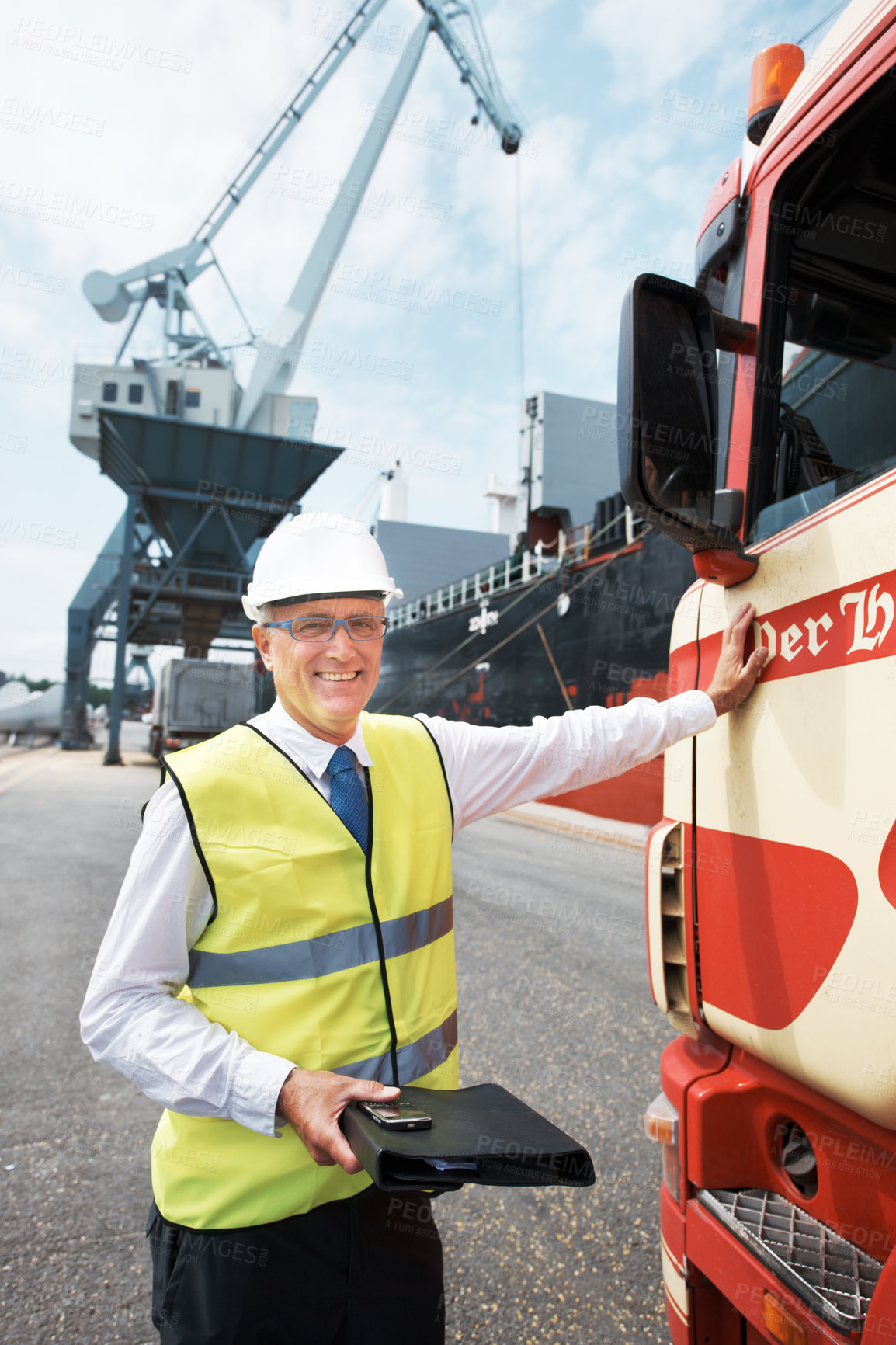 Buy stock photo Portrait of a dock worker standing at the harbor amidst shipping industry activity