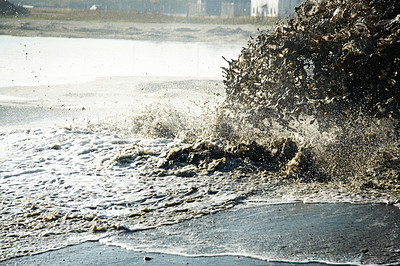 Buy stock photo Pollution, sewer and waste in water to ocean from industrial for construction, pipeline and danger. Environment, texture and industry with wave from sewage on shoreline for stream, foam and mud