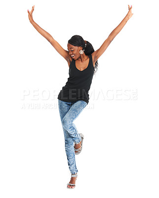 Buy stock photo Studio shot of a carefree young woman with her arms raised isolated on white
