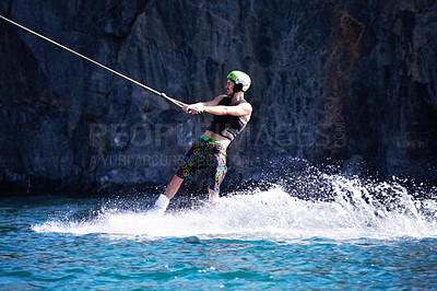 Buy stock photo Splash, surf and wakeboarding with man in lake for extreme sports, summer break and travel vacation. Wave, adrenaline junkie and fitness with guy skiing on river for health, adventure and speed