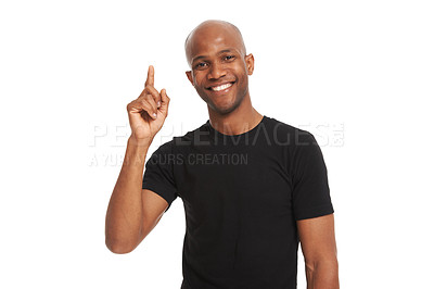 Buy stock photo Man, smile and finger for idea with pointing up, studio and announcement for portrait on white background. African person, fashion aesthetic and advertising with happiness in mockup for casual look

