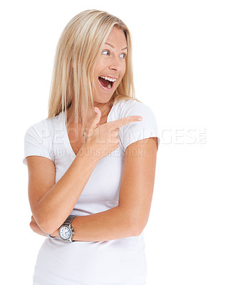 Buy stock photo Woman, excited and pointing hand in studio for advertising, promotion or announcement. Face of happy female model isolated on a white background to show marketing mockup space for logo or brand sale