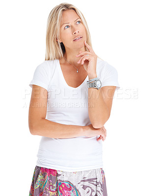 Buy stock photo Studio shot of an attractive woman looking thoughtful against a white background