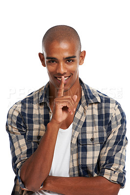 Buy stock photo Quiet, secret and portrait of a black man with fingers on lips on a white background in studio. Silent, peace and African model with a hand gesture for silence and smile on a studio background