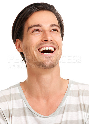 Buy stock photo Man, happy and fashion aesthetic with relax, looking up and laughter by white background in studio. Handsome young model, male and smile with confidence in positive, mockup and casual style for fun