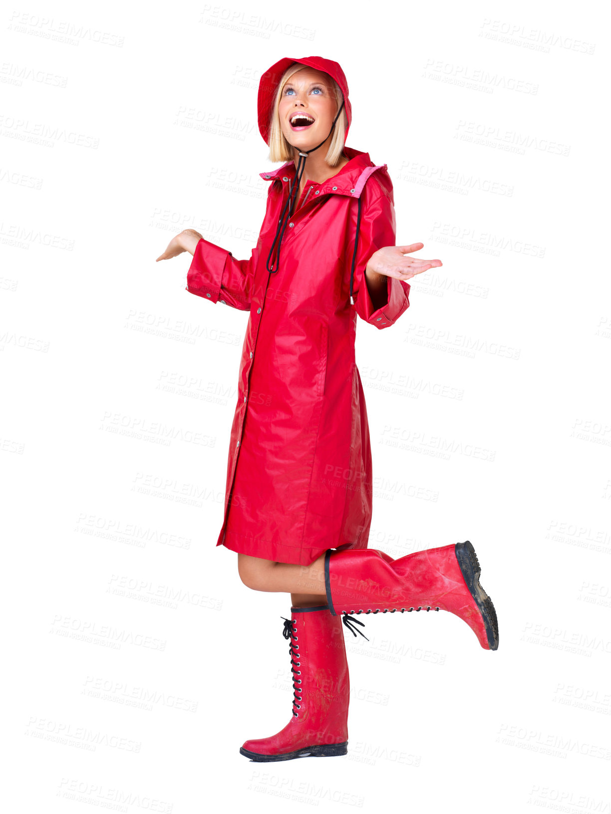 Buy stock photo Winter, red raincoat and woman on a white background with smile, content and happy mindset. Creative aesthetic, weather and isolated full body of girl with boots for style, trendy clothes and fashion